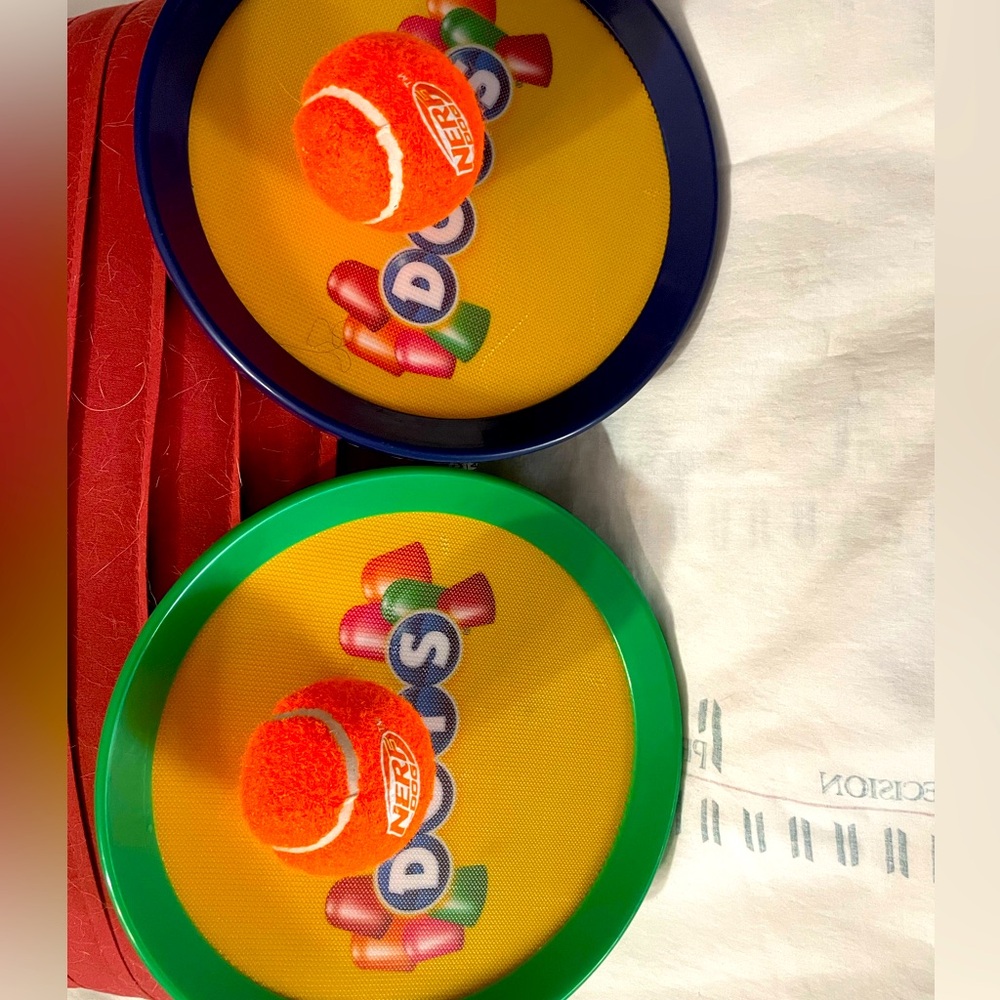 Kids paddle ball set with orange tennis balls